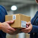 Parcels being securely barcoded and handed over for delivery